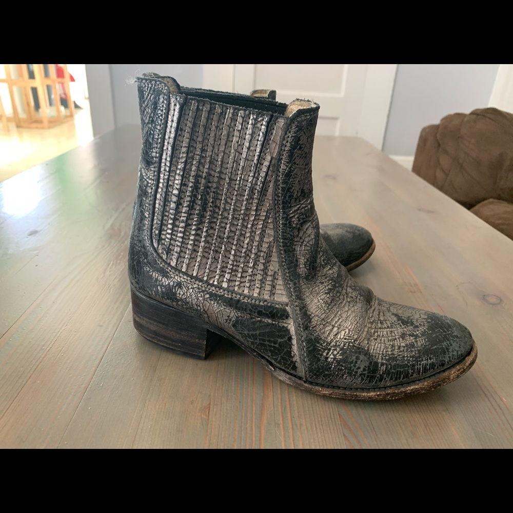 Woman’s distressed biker boots